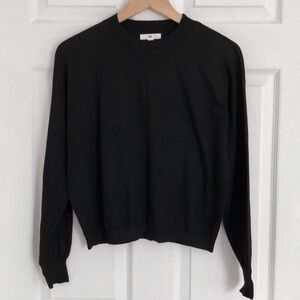 Plain black crewneck sweater
